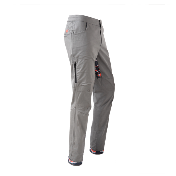 Rock pants in gray for climbing with stretch panel in native red and zip pocket above knee