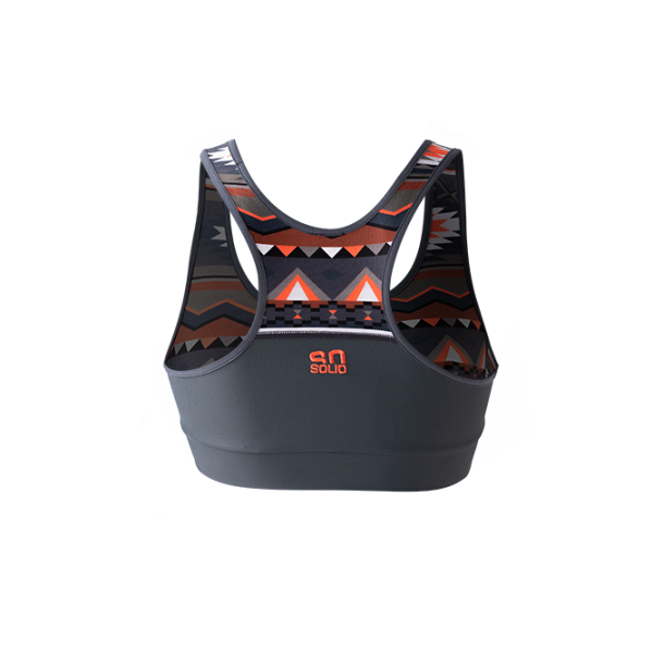 SO SOLID back view of reversible sports bra with partial native pattern in gray with red details - made out of recycled nylon